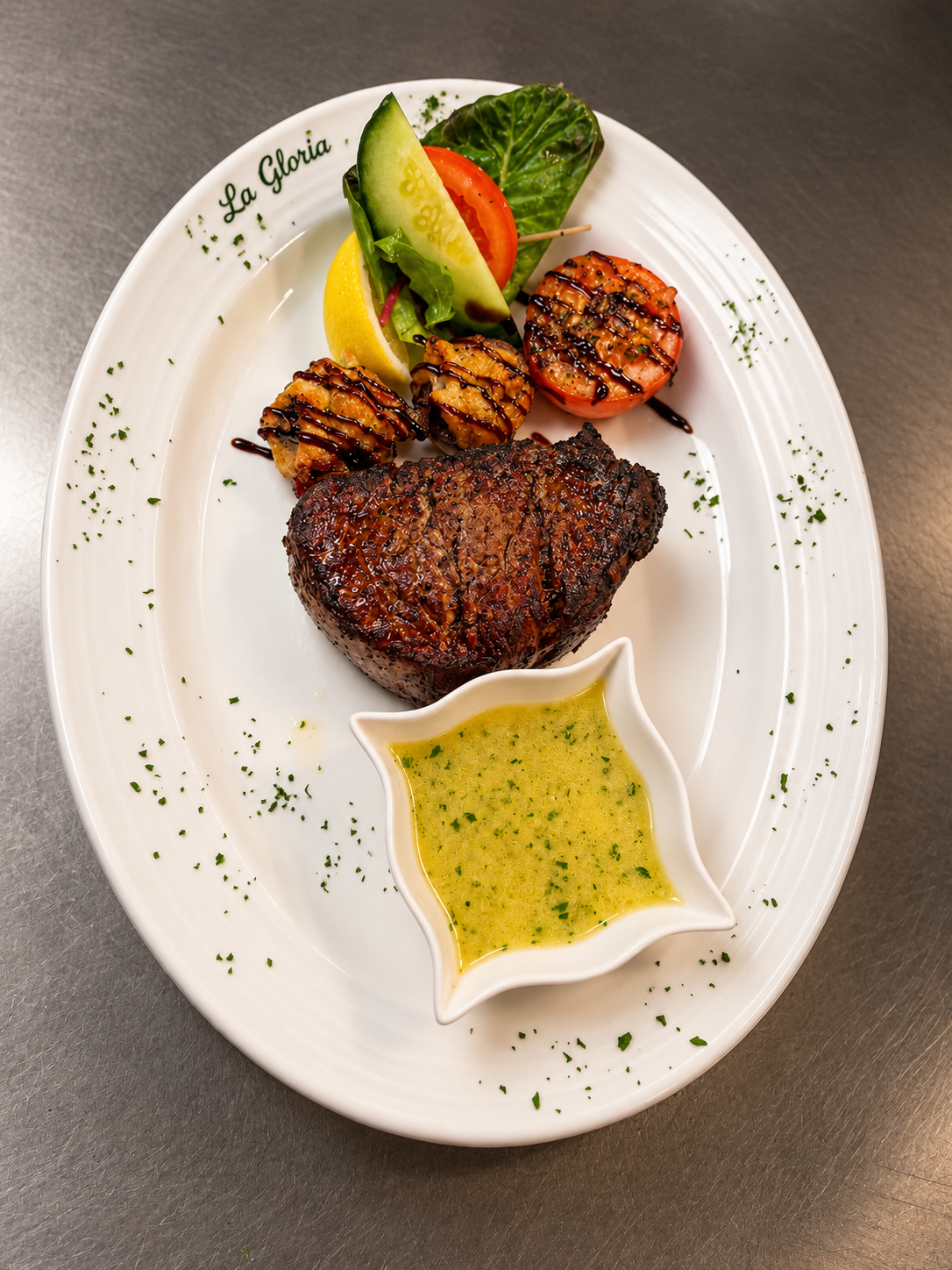 La Gloria fillet steak with grilled vegetables and sauce
